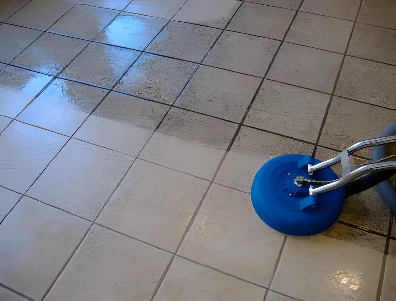 Rotary steam tool cleaning tile and grout